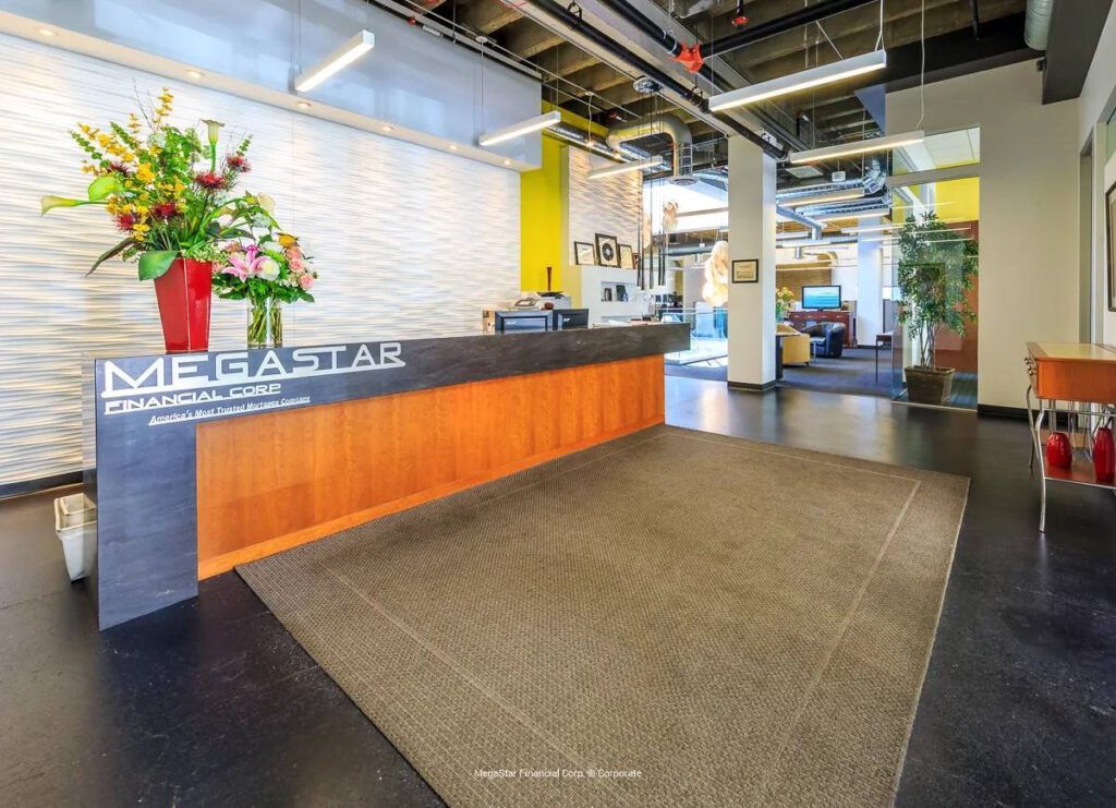 MegaStar Financial Corp corporate office reception area with company logo.